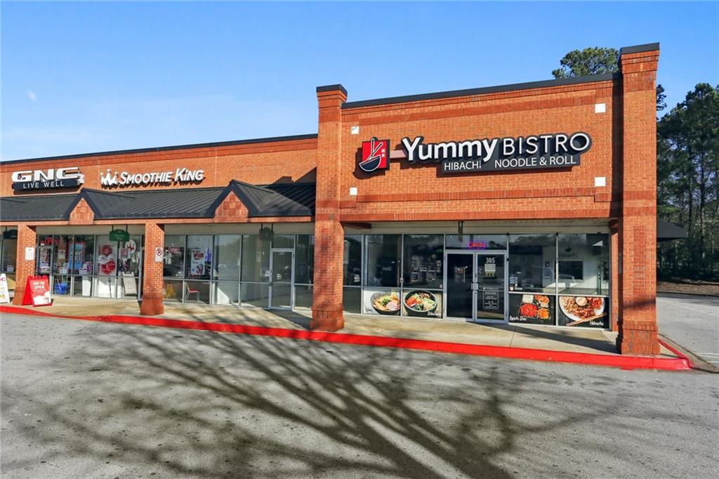 4667 Glore Road Southwest Mableton, GA 30126 - Photo 45 of 46 a sign on the side of a building