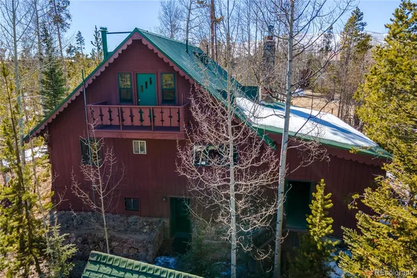 a house with trees in front of it