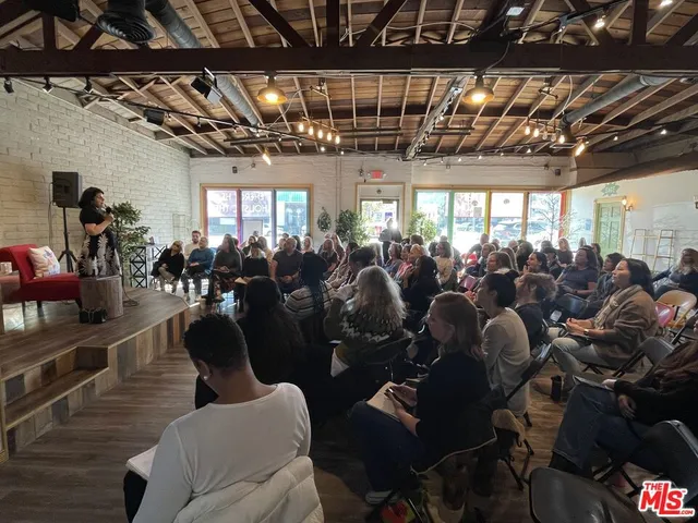 a group of people sitting in a room