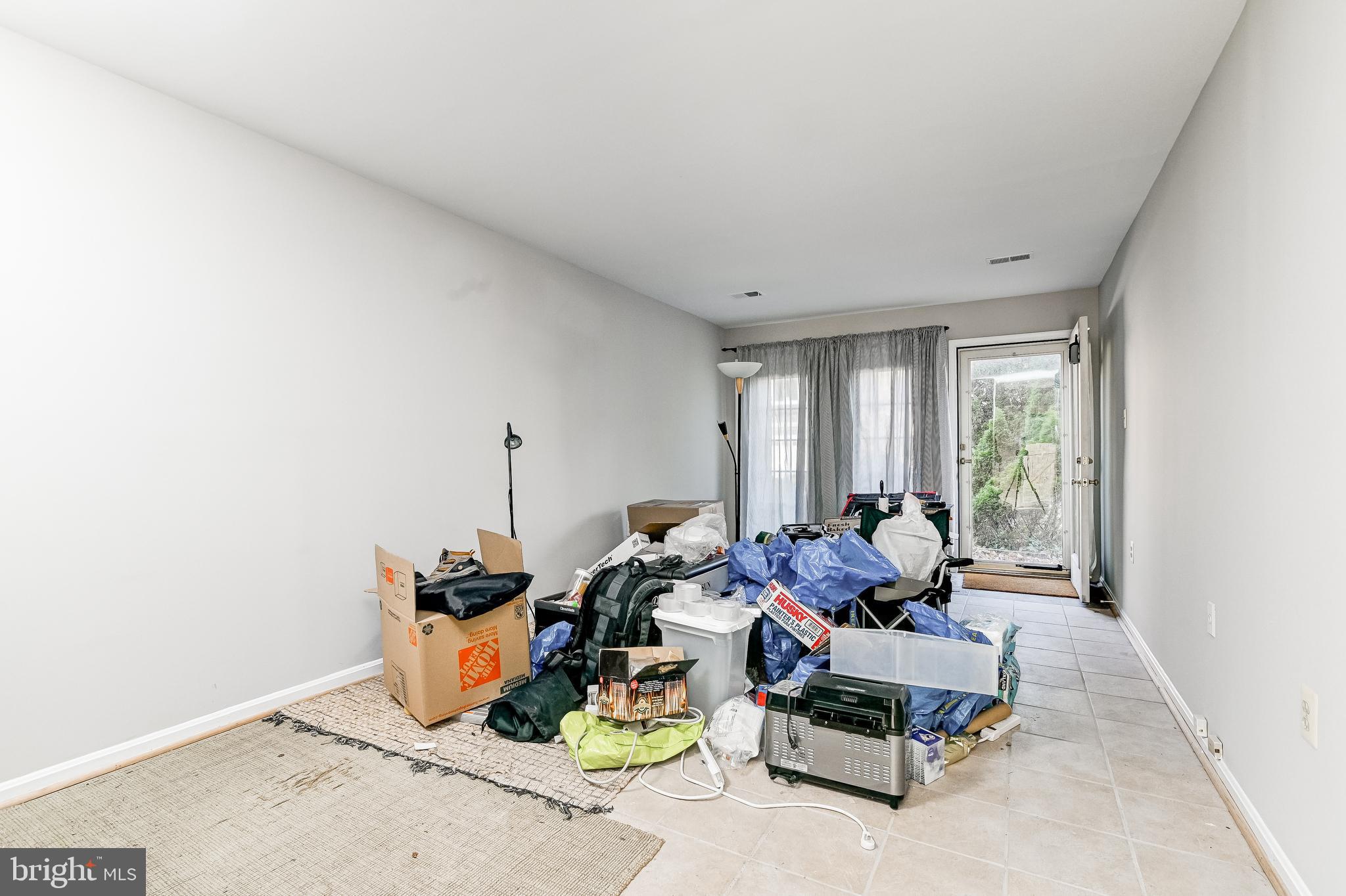 10936 Pebble Run Drive Silver Spring, MD 20902 - Photo 51 of 57 rec room looking towards front door
