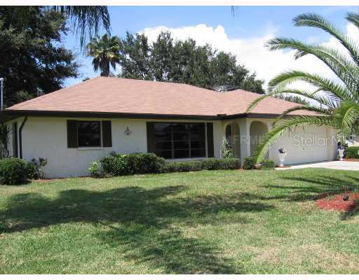 323 Altair Road Venice, FL 34293 - Photo 1 of 1 a front view of a house with garden