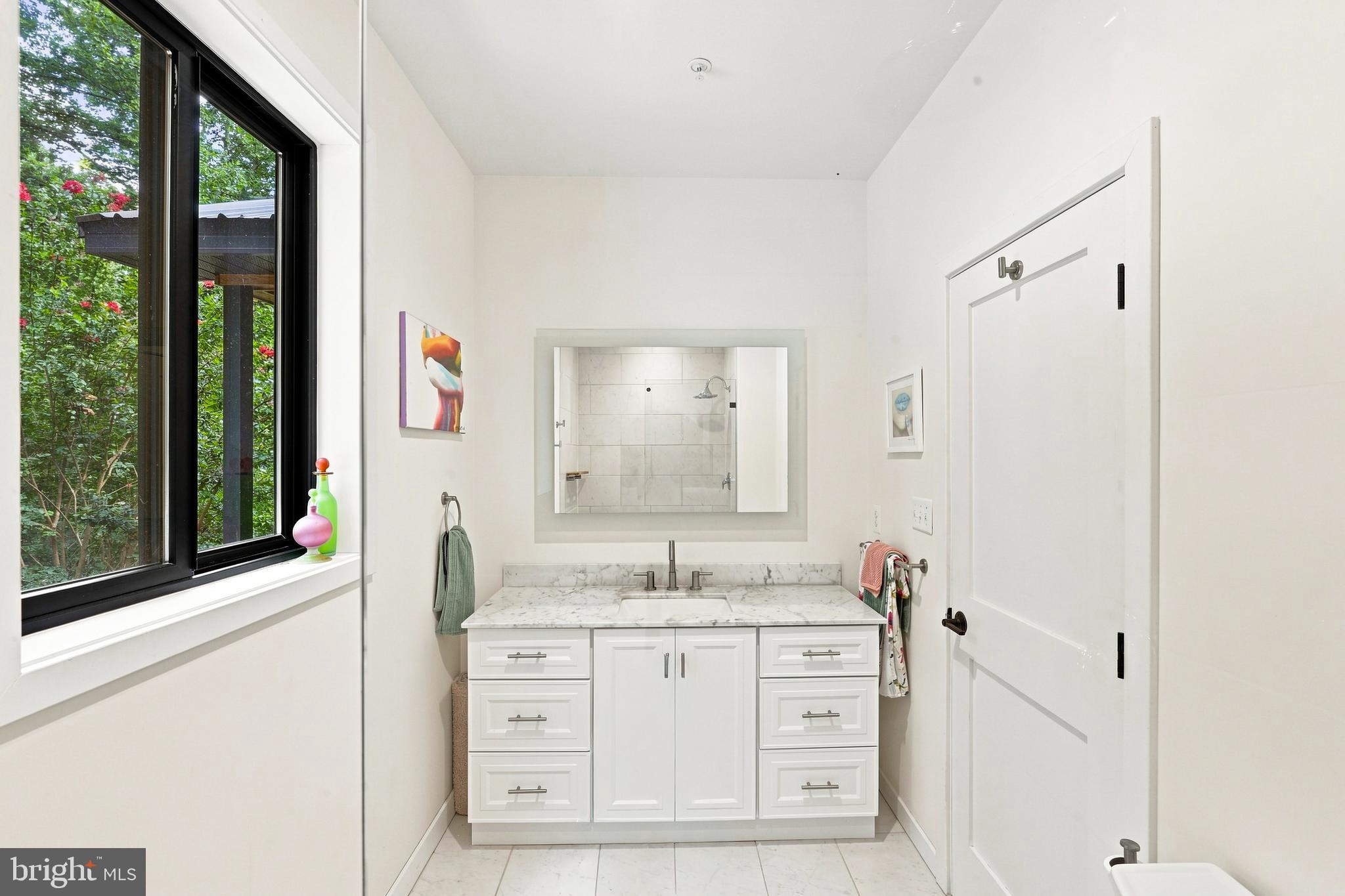 4244 Butler Road Glyndon, MD 21136 - Photo 21 of 50 Main Level Primary bedroom ensuite bathroom