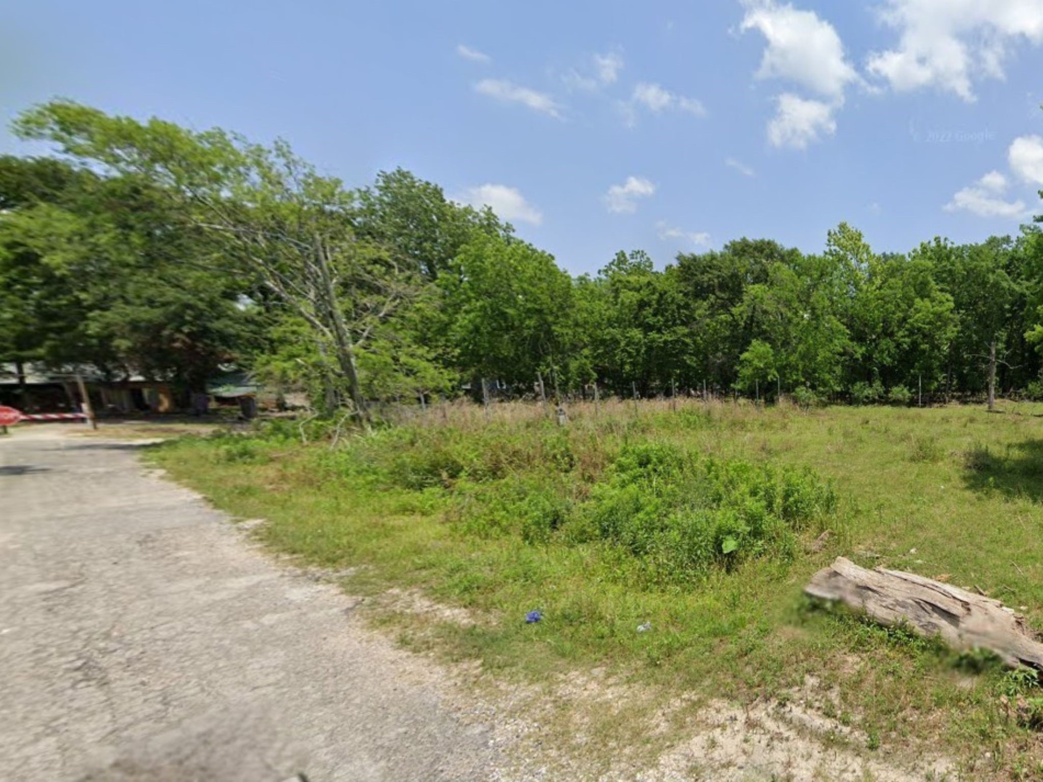 9146 Simmons Houston, TX 77093 - Photo 2 of 6 a backyard of a house with lots of green space