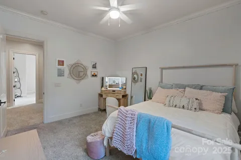a bathroom with a granite countertop sink toilet a mirror and shower