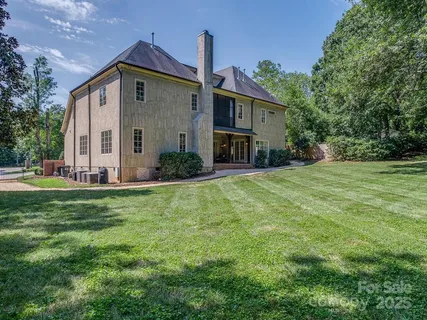 a view of lake with green space