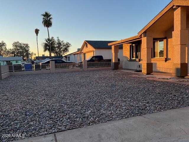 8052 West Pierson Street Phoenix, AZ 85033 - Photo 11 of 36 a house view with a garden space