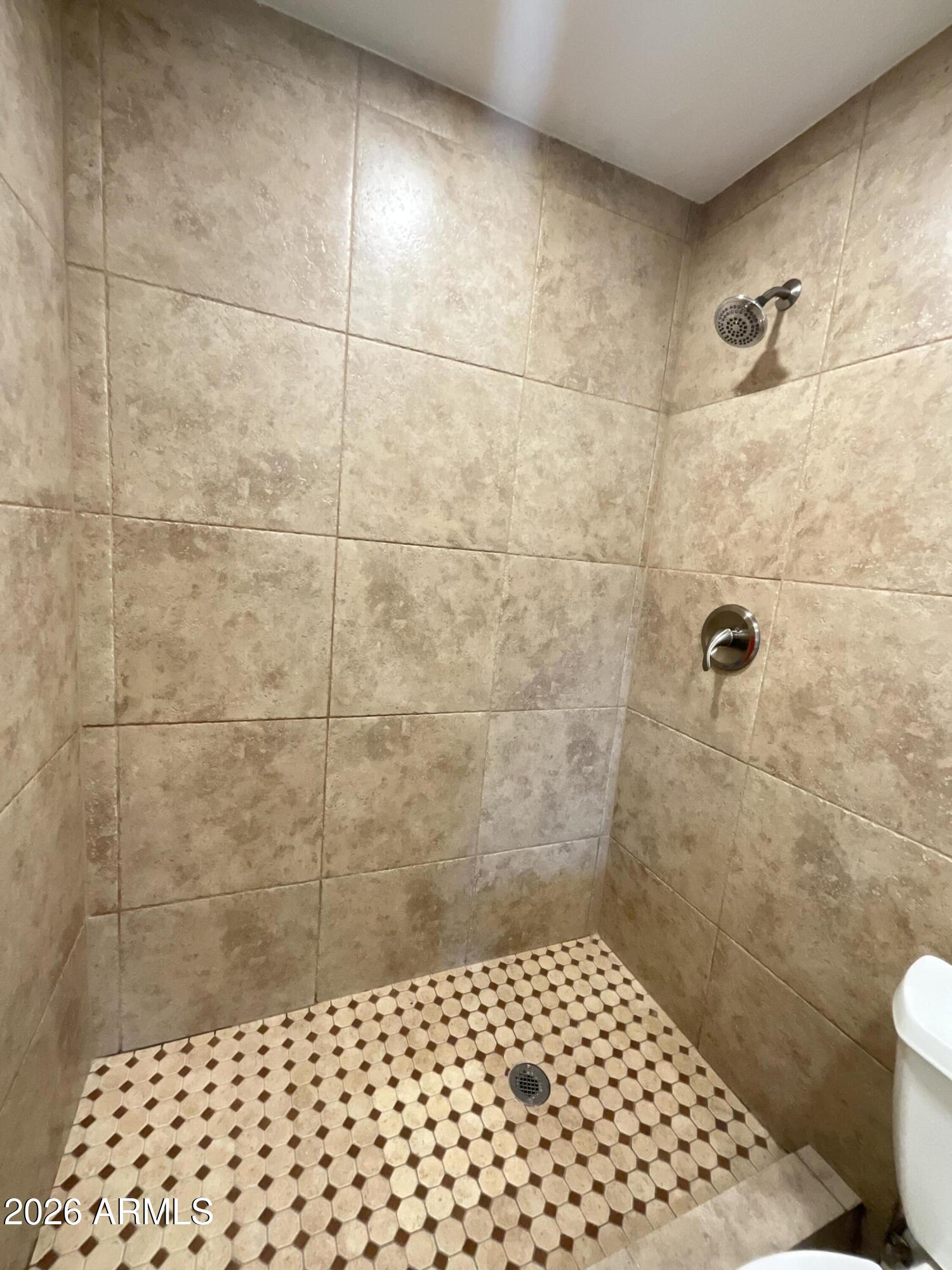 8052 West Pierson Street Phoenix, AZ 85033 - Photo 18 of 36 a bathroom with a sink