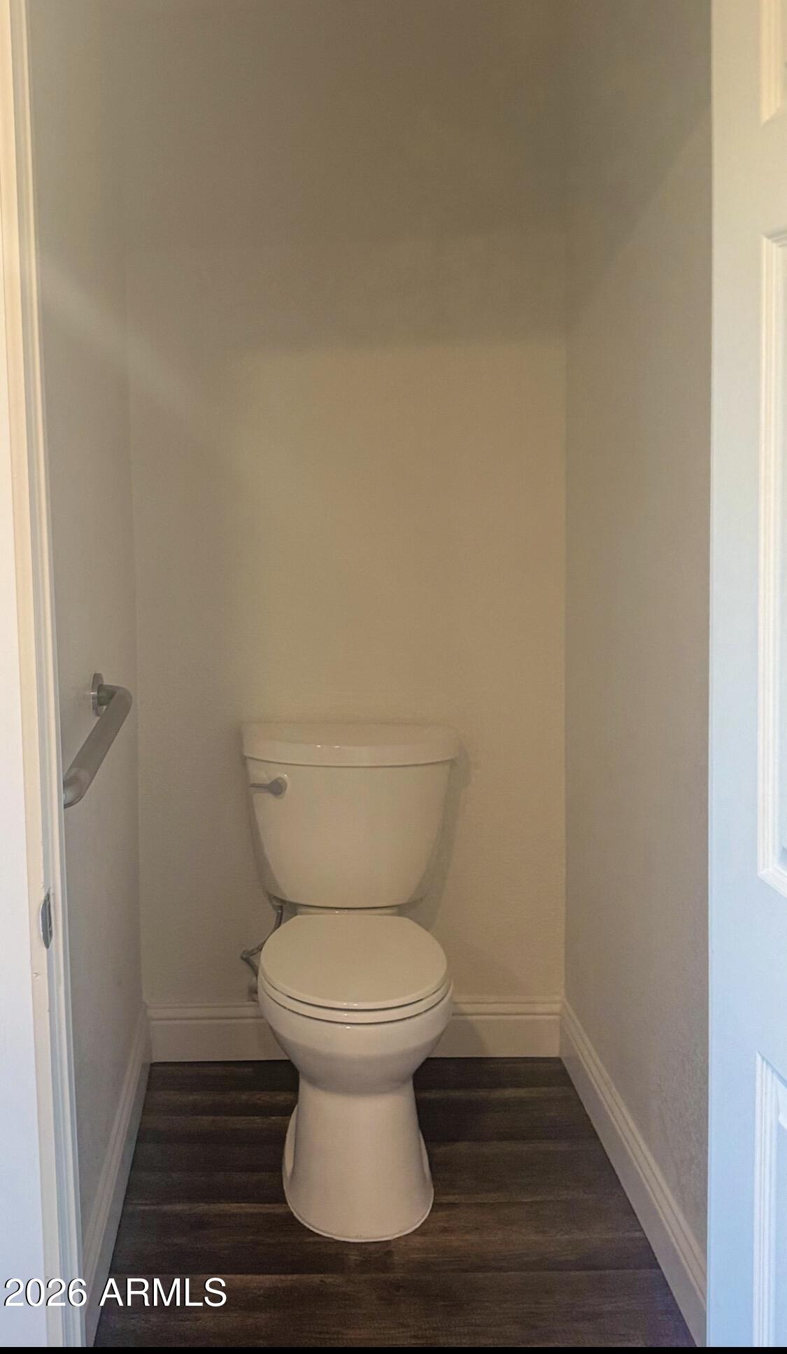 8052 West Pierson Street Phoenix, AZ 85033 - Photo 20 of 36 a bathroom with a toilet and a shower