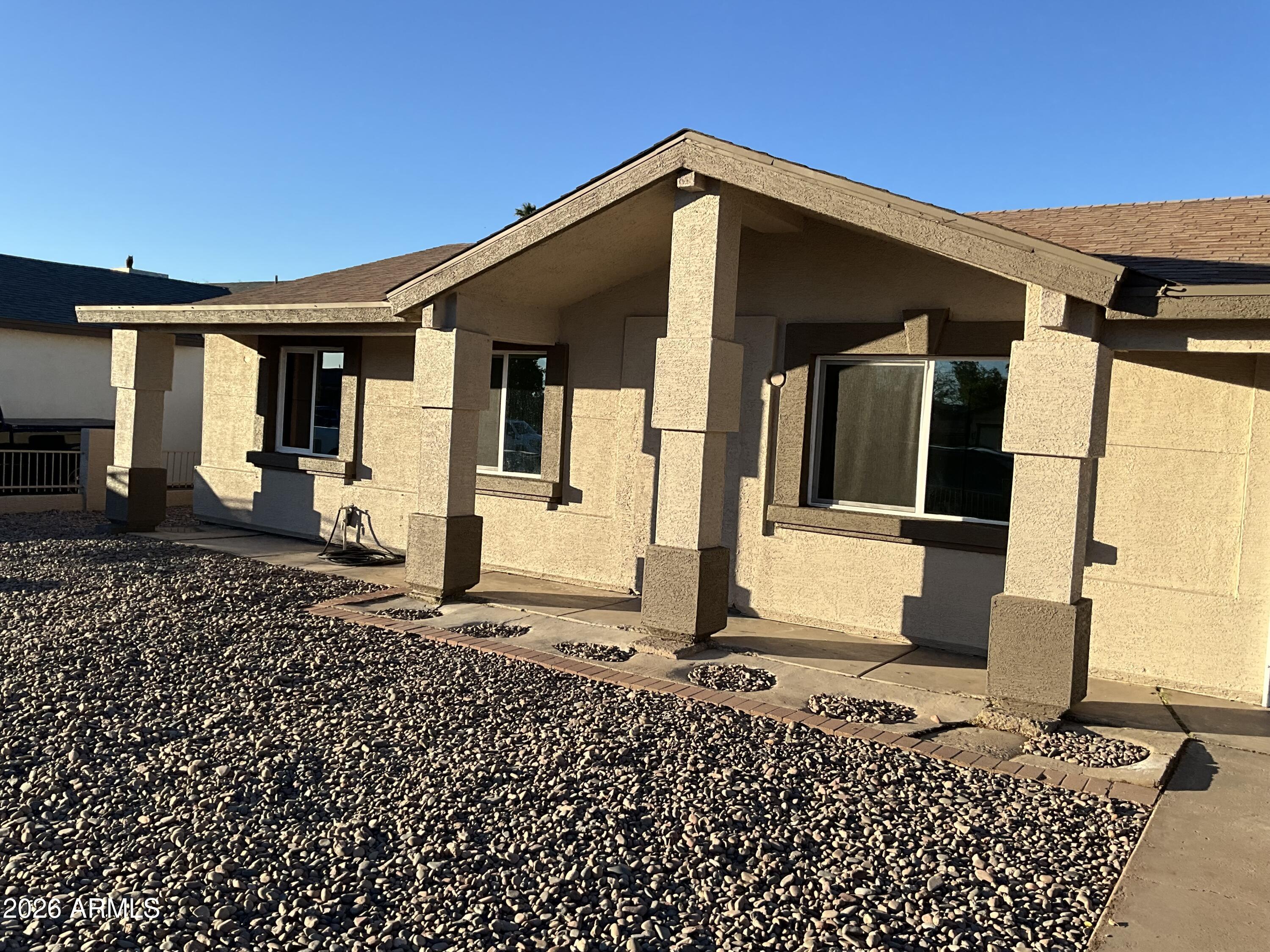 8052 West Pierson Street Phoenix, AZ 85033 - Photo 5 of 36 a front view of a house with a gate