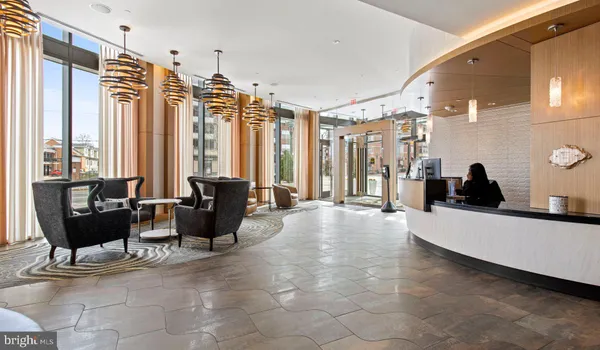 a view of an empty room and a window