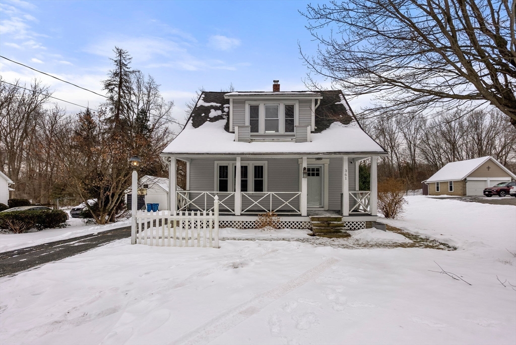 a front view of a house with a outdoor space