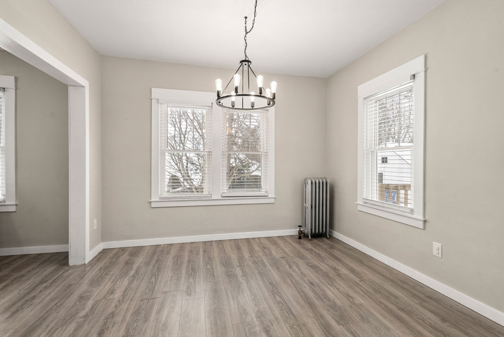361 Prospect Avenue West Springfield, MA 01089 - Photo 16 of 35 a view of an empty room with wooden floor and a window