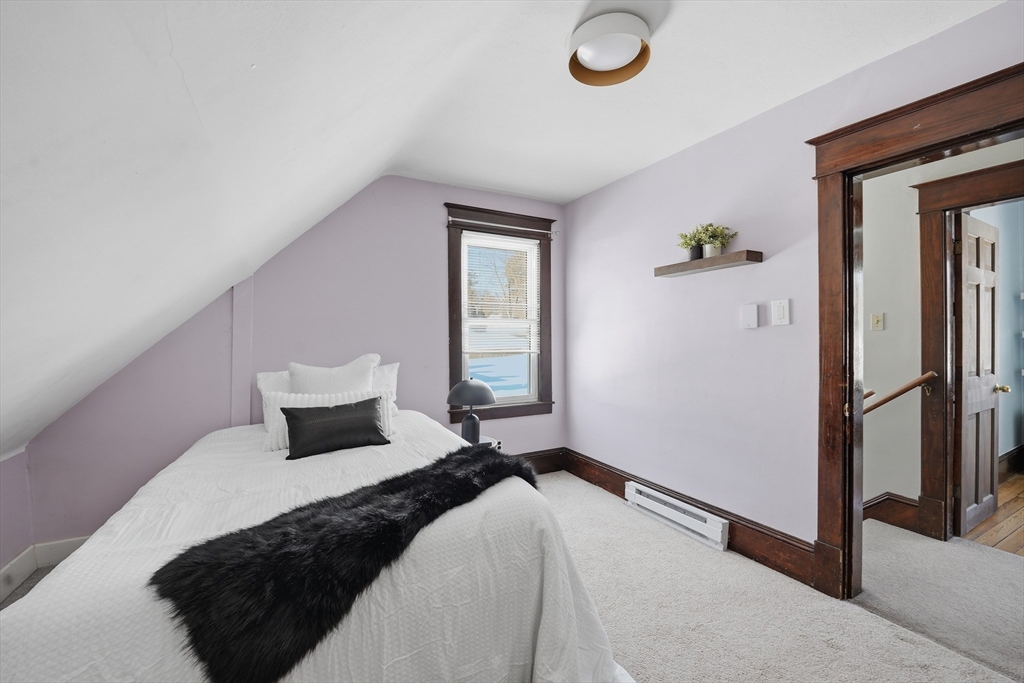 361 Prospect Avenue West Springfield, MA 01089 - Photo 21 of 35 a bedroom with a bed and a window