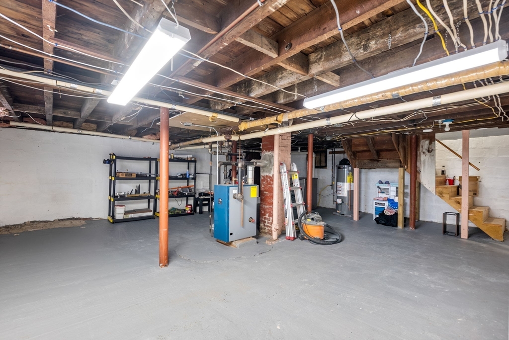 361 Prospect Avenue West Springfield, MA 01089 - Photo 34 of 35 a view of water heater room with gym equipment
