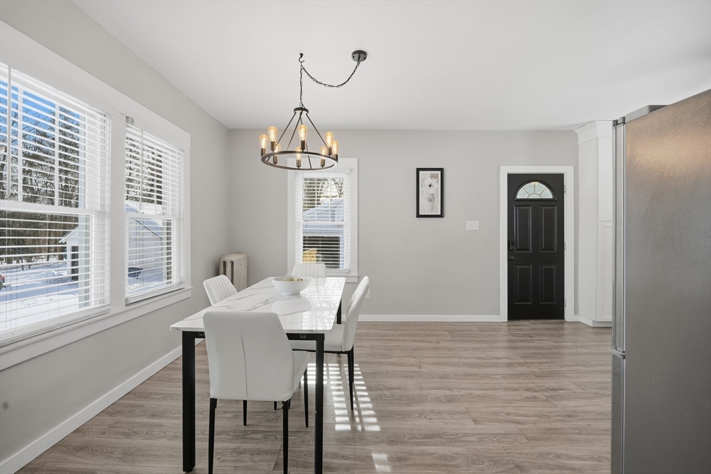 361 Prospect Avenue West Springfield, MA 01089 - Photo 8 of 35 a view of a dining room with furniture window and wooden floor
