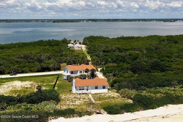 a view of a lake from a yard