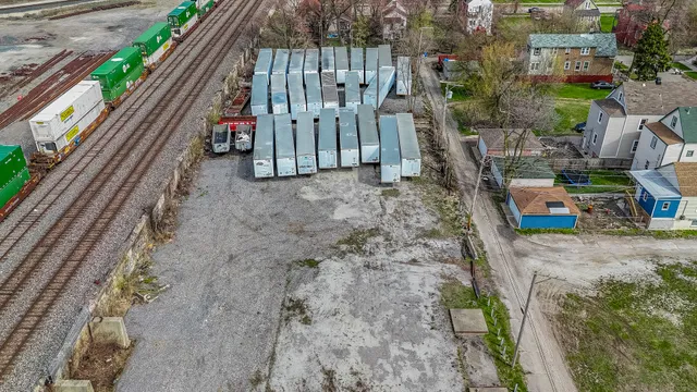 a balcony with next to a yard