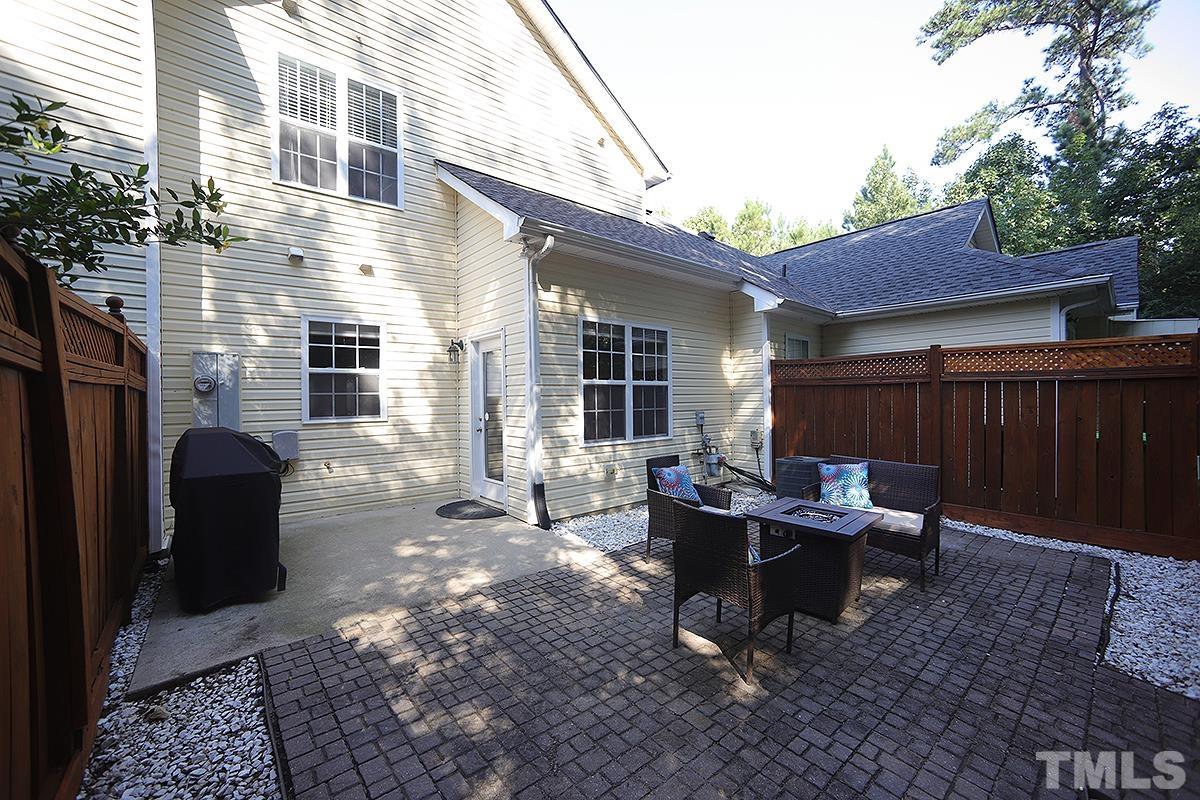 2656 Andover Glen Road Raleigh, NC 27604 - Photo 15 of 18 a backyard of a house with outdoor seating