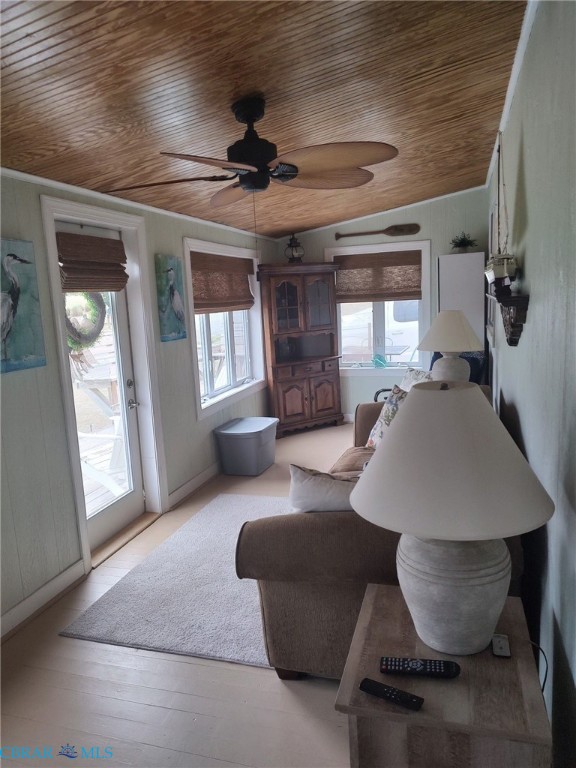 777 Marsh Pungo Road Locust Hill, VA 23092 - Photo 42 of 46 Living area with wooden ceiling, ceiling fan, and light wood-type flooring