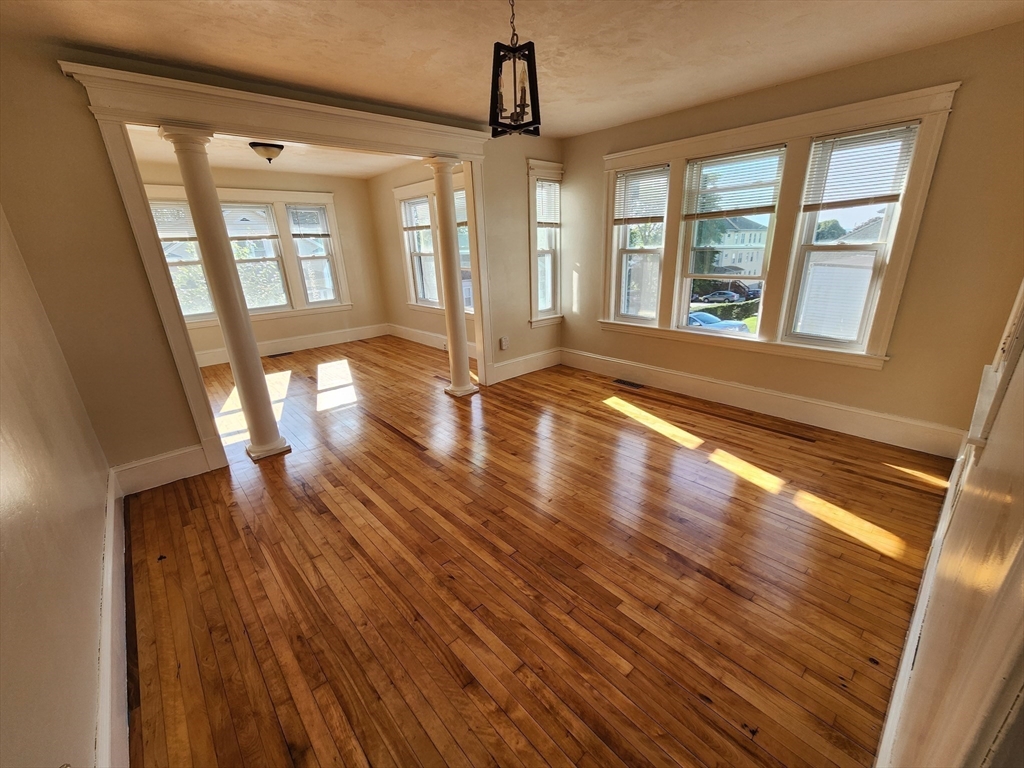 24 Ingleside Avenue Worcester, MA 01604 - Photo 13 of 39 a view of an entryway with wooden floor and windows
