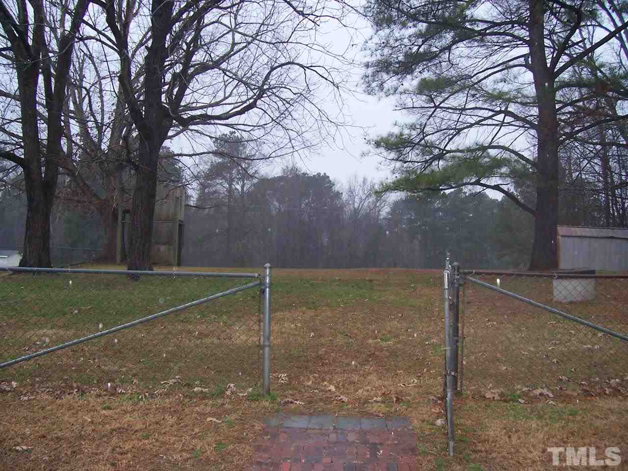 343 Cooke Road Louisburg, NC 27549 - Photo 22 of 23 View from Deck into large backyard