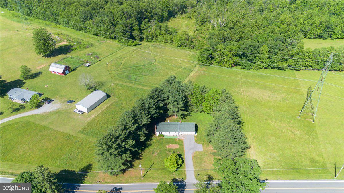 13806 Wolfsville Road Smithsburg, MD 21783 - Photo 6 of 35 a view of a yard with an outdoor space
