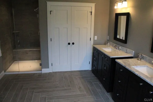 a bathroom with a sink and a mirror