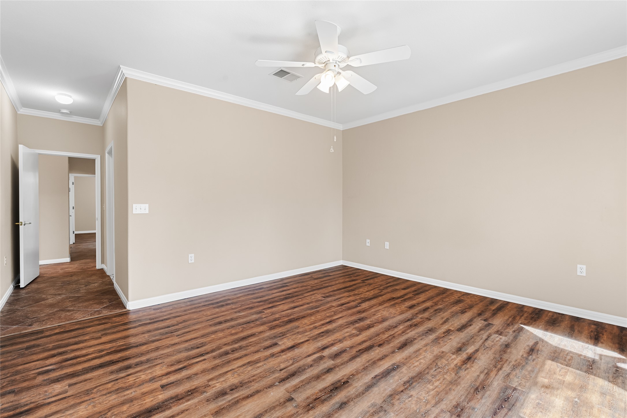 103 Harness Lane Georgetown, TX 78633 - Photo 19 of 38 a view of an empty room with wooden floor
