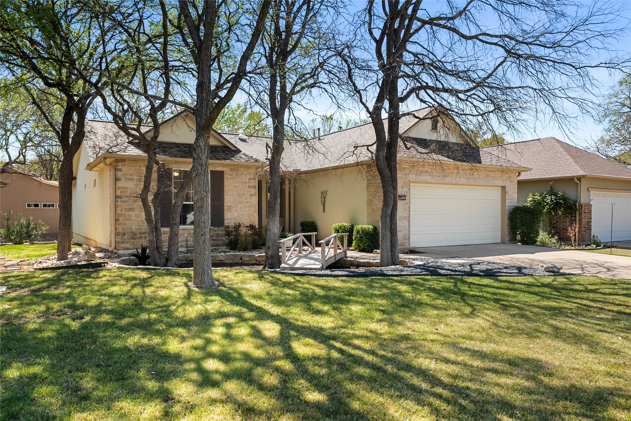 103 Harness Lane Georgetown, TX 78633 - Photo 2 of 38 a view of a house with backyard porch and sitting area