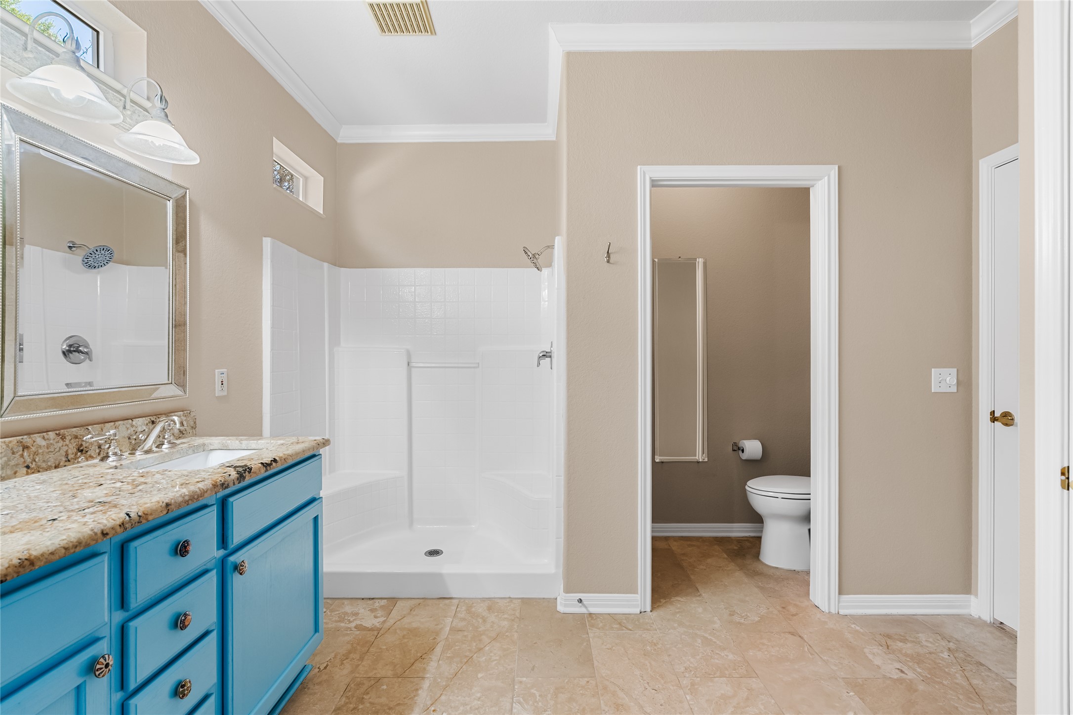 103 Harness Lane Georgetown, TX 78633 - Photo 21 of 38 a bathroom with a granite countertop sink toilet and shower