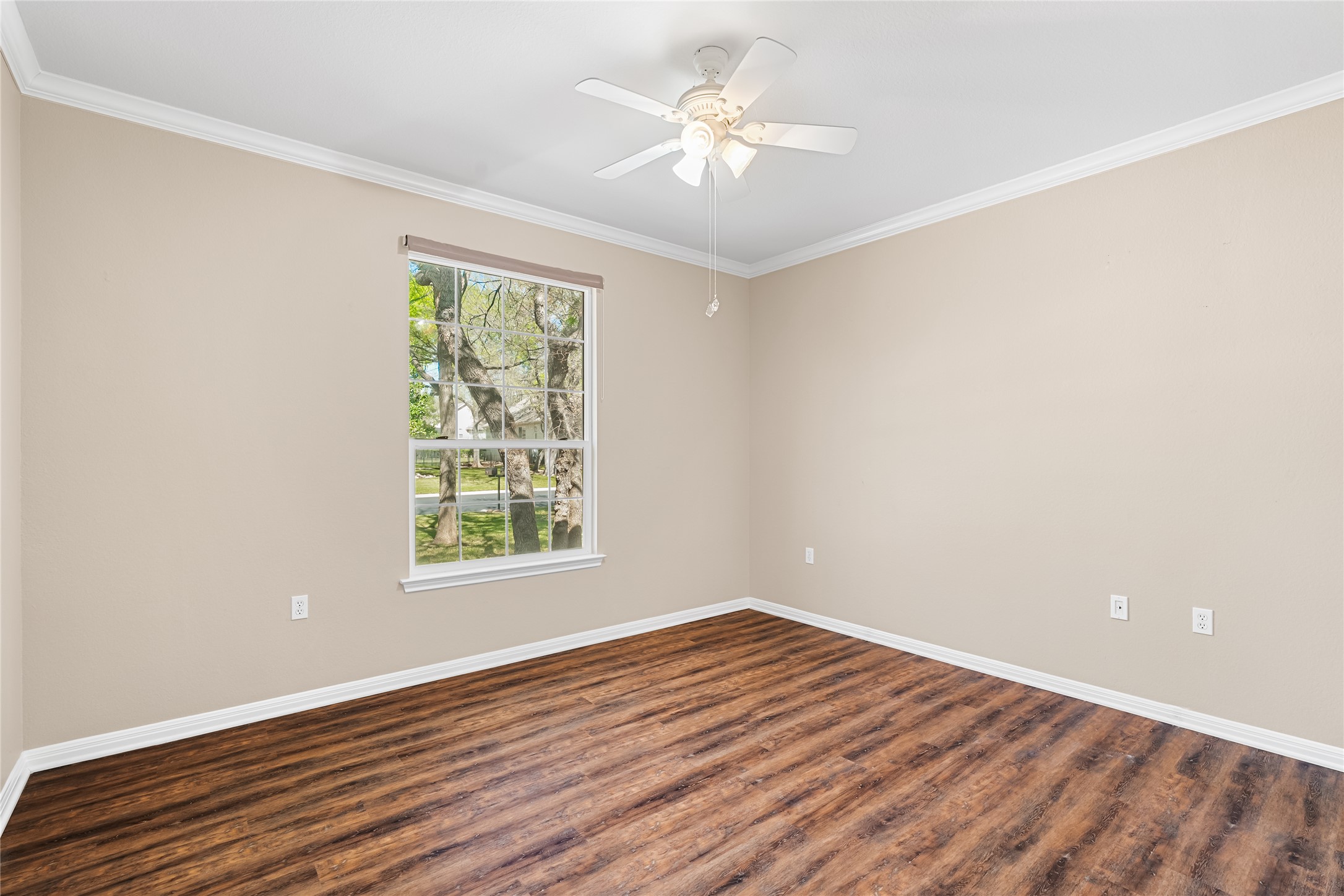 103 Harness Lane Georgetown, TX 78633 - Photo 23 of 38 wooden floor in an empty room with a window