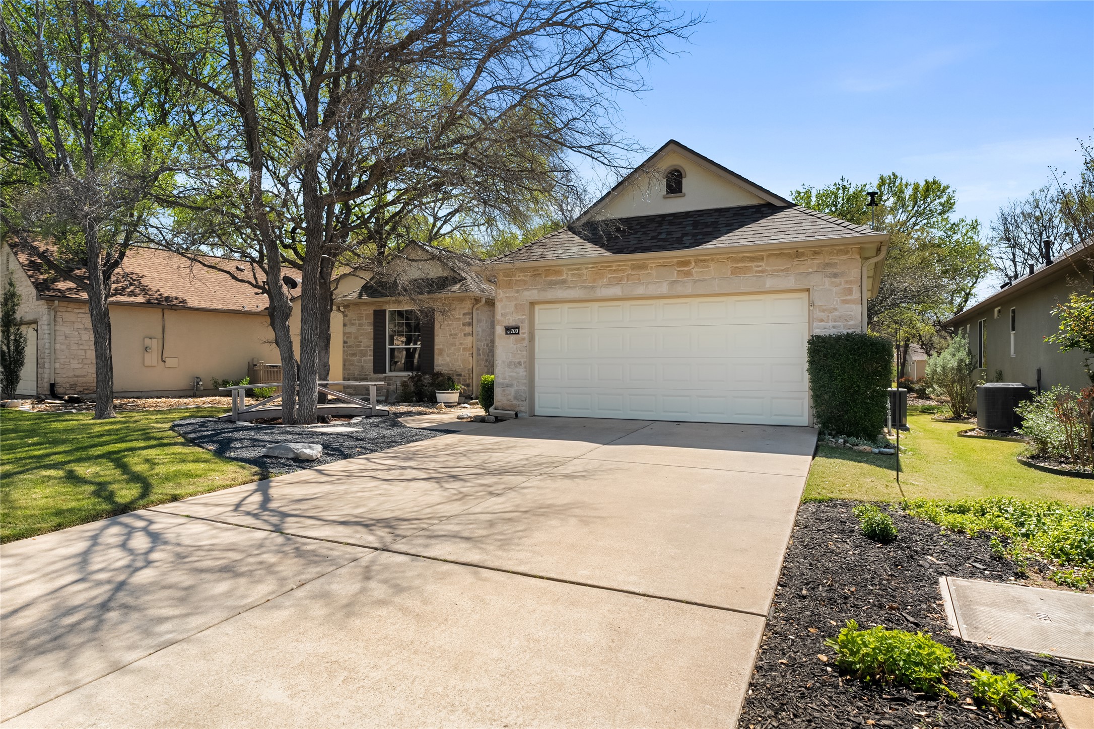 103 Harness Lane Georgetown, TX 78633 - Photo 3 of 38 a front view of house with yard and trees in the background