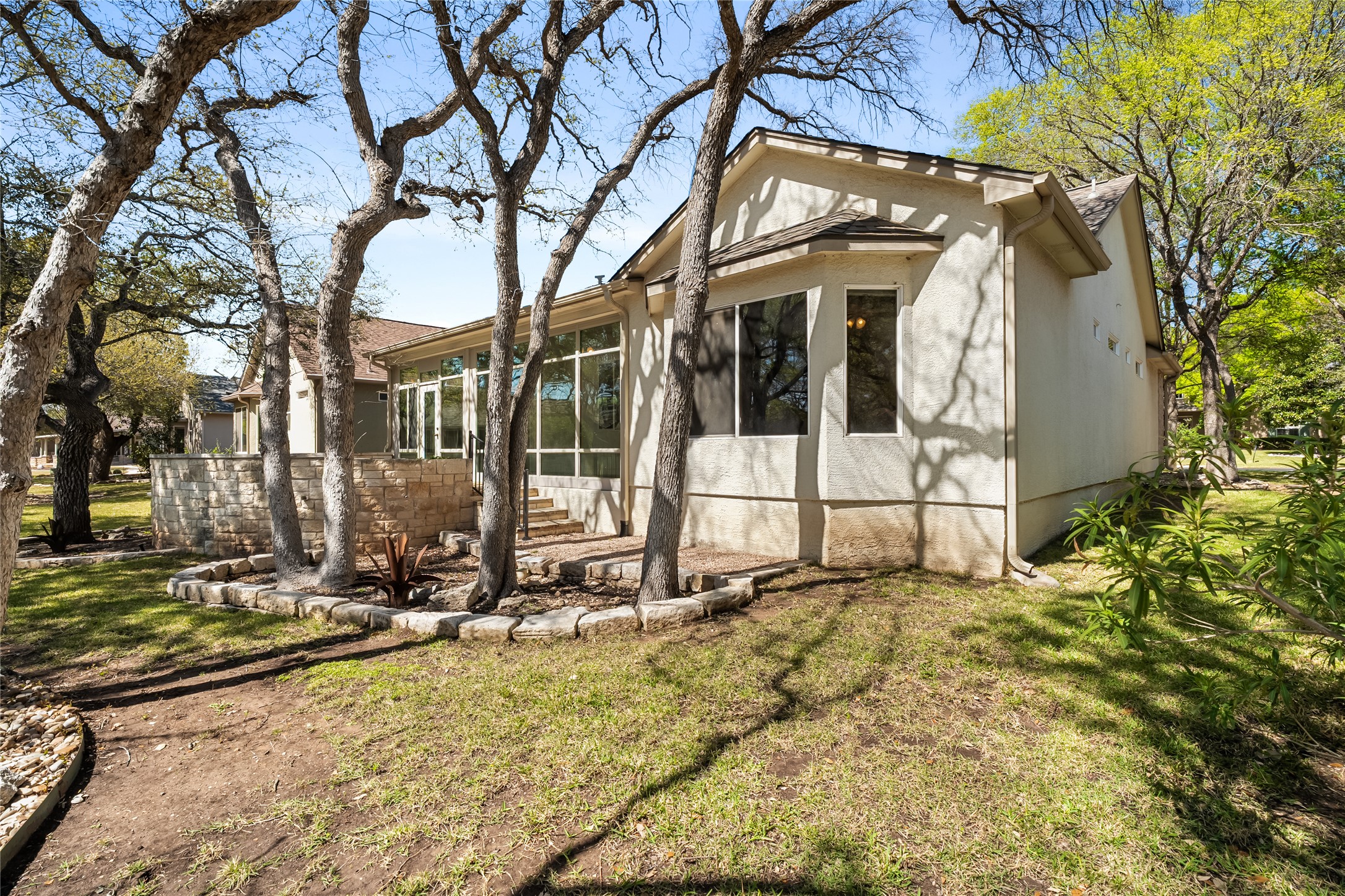 103 Harness Lane Georgetown, TX 78633 - Photo 31 of 38 a view of a house with snow on the wall and a tree