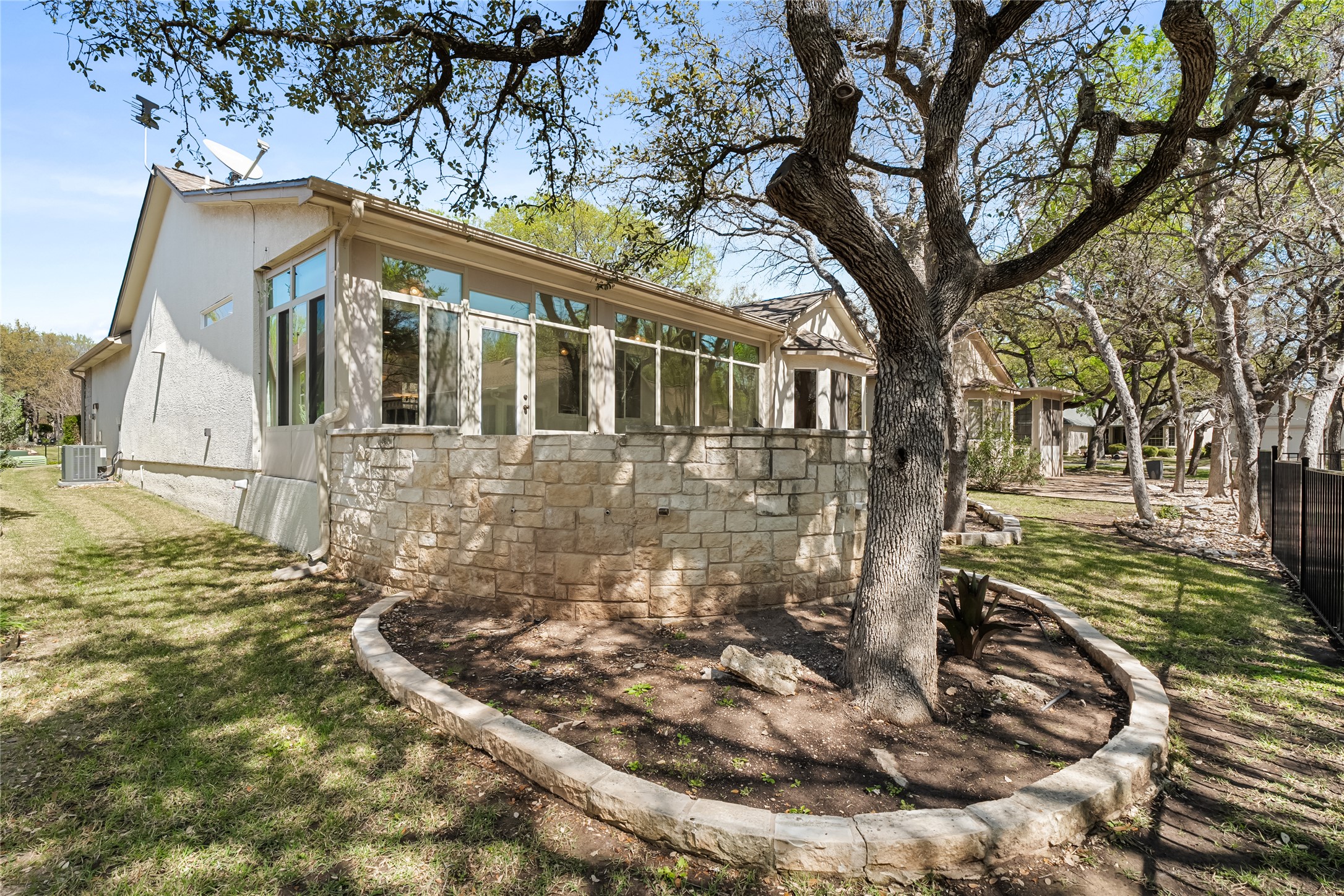 103 Harness Lane Georgetown, TX 78633 - Photo 32 of 38 a view of a large yard with plants and large trees