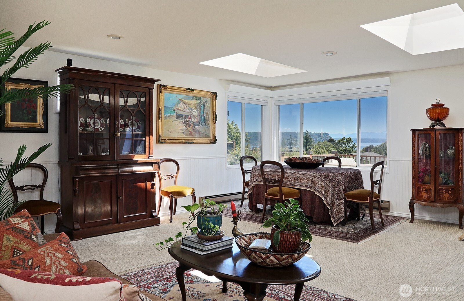 424 Island View Lane Langley, WA 98260 - Photo 11 of 39 a living room with furniture chess board and kitchen view