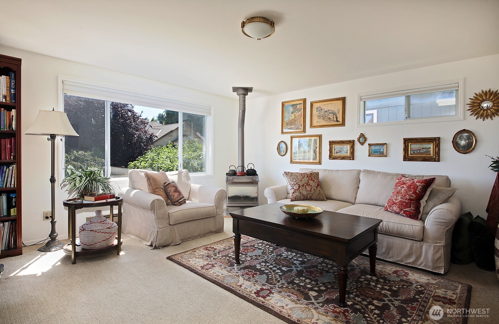 424 Island View Lane Langley, WA 98260 - Photo 15 of 39 a living room with furniture and a large window