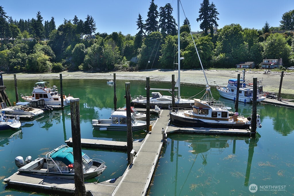 424 Island View Lane Langley, WA 98260 - Photo 35 of 39 a view of a lake with boats