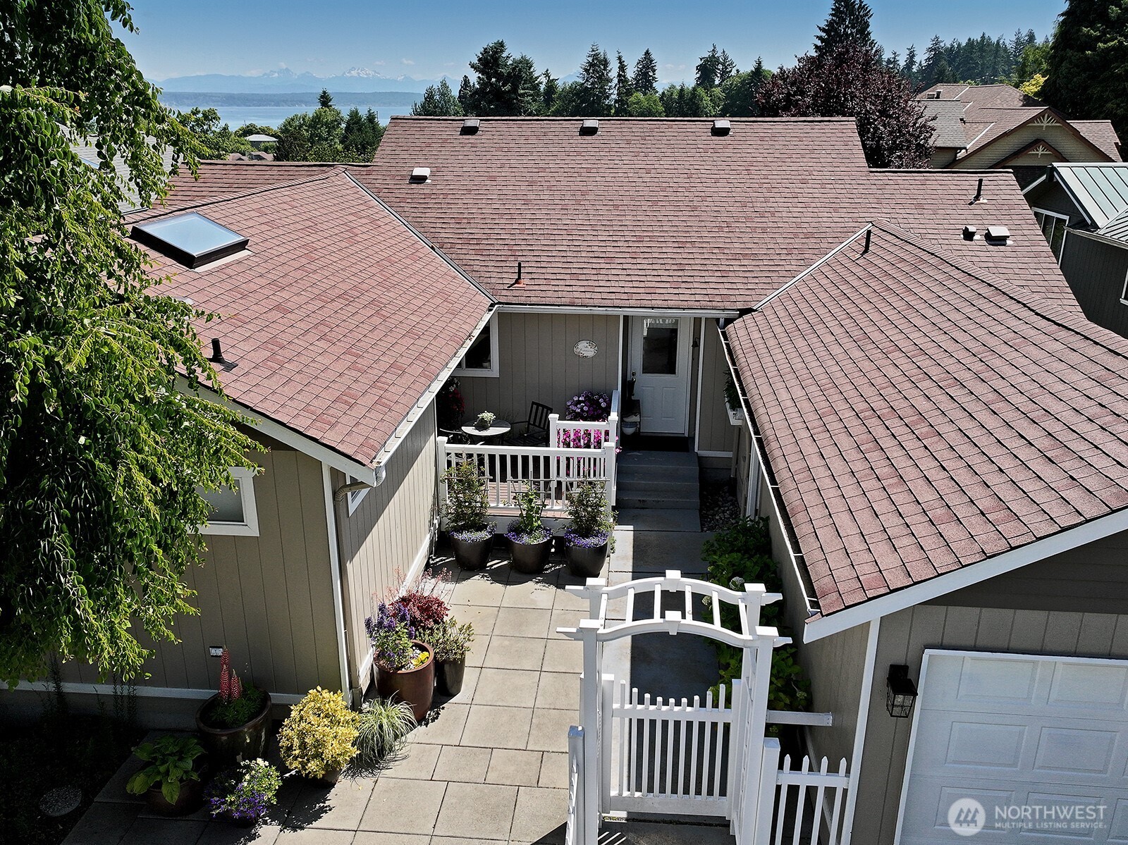 424 Island View Lane Langley, WA 98260 - Photo 6 of 39 a view of a house with a patio