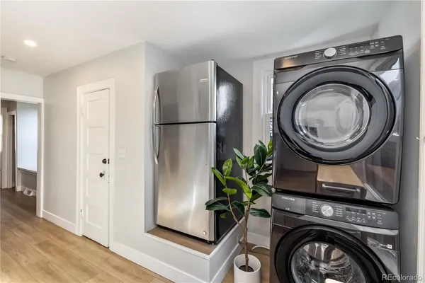 a view of livingroom with washer and dryer