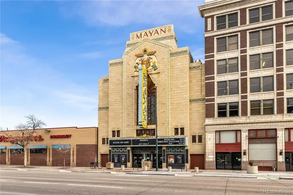 a view of a building with a street