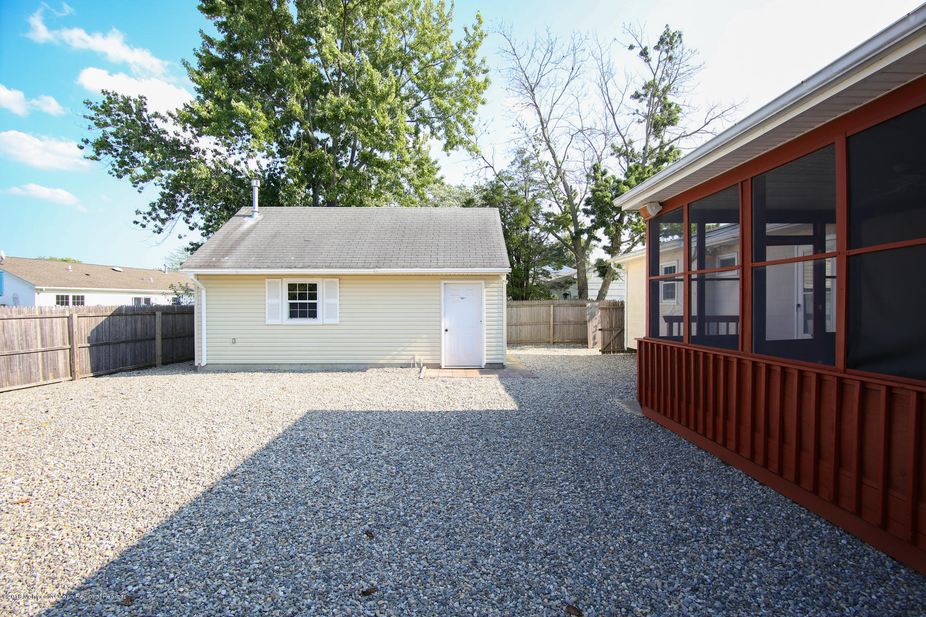 171 Binnacle Road Brick, NJ 08723 - Photo 5 of 32 a house with trees in front of it