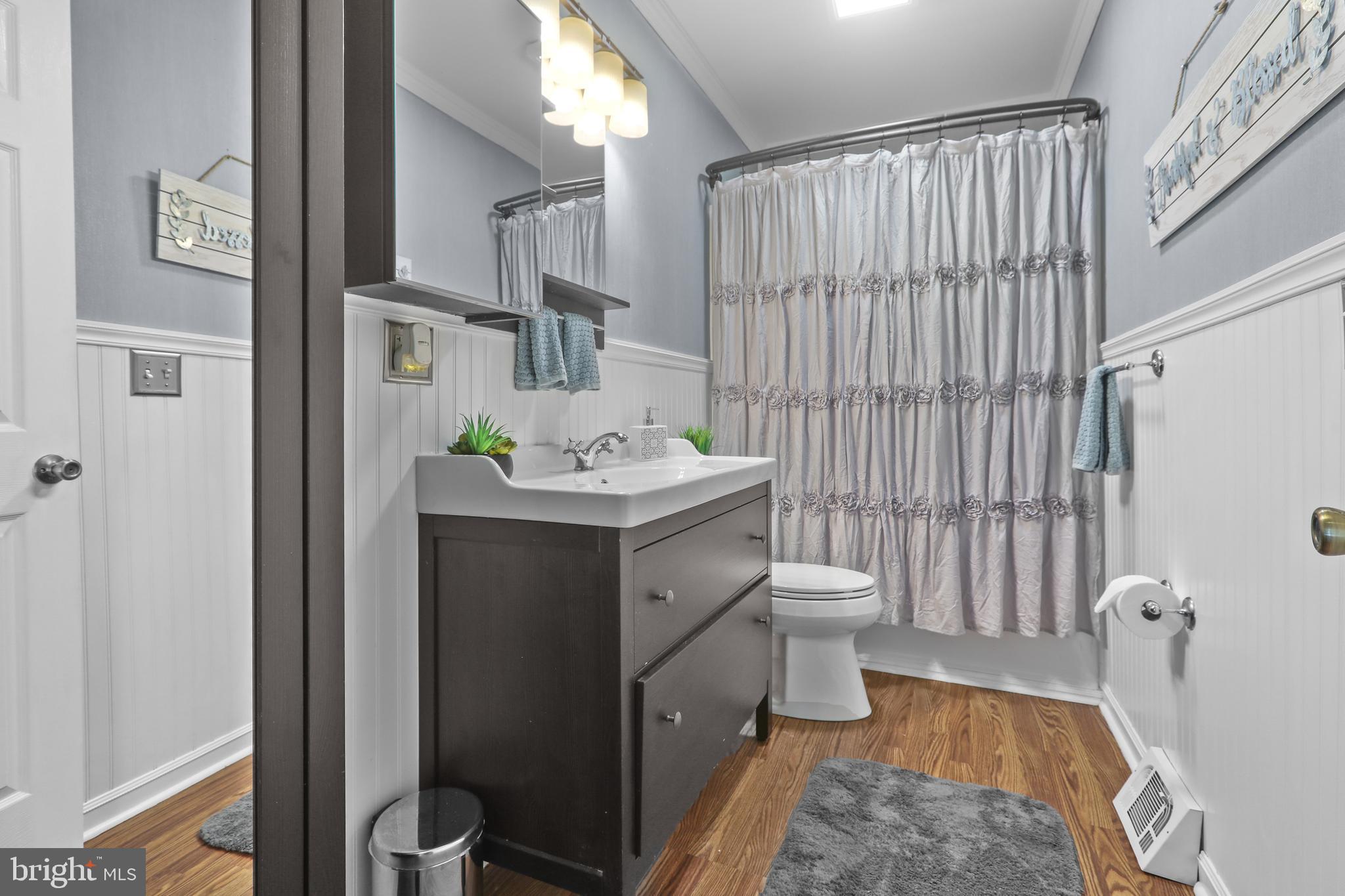 7007 Dunhill Road Dundalk, MD 21222 - Photo 17 of 32 Full Bathroom w/ new ceiling, exhaust fan/light