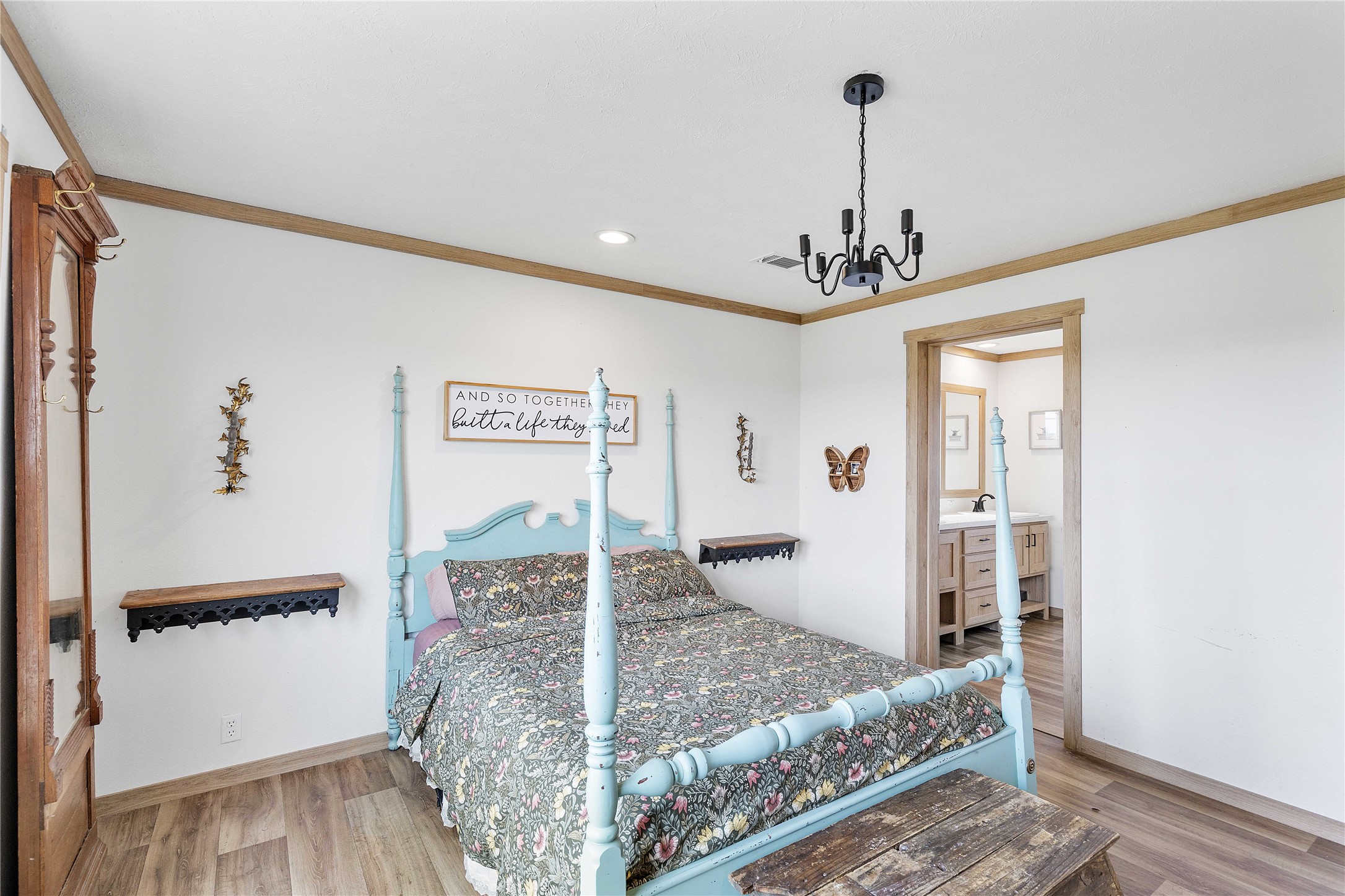 21550 Wilber Road Winnie, TX 77665 - Photo 17 of 28 a bed room with a bed mirror and a window