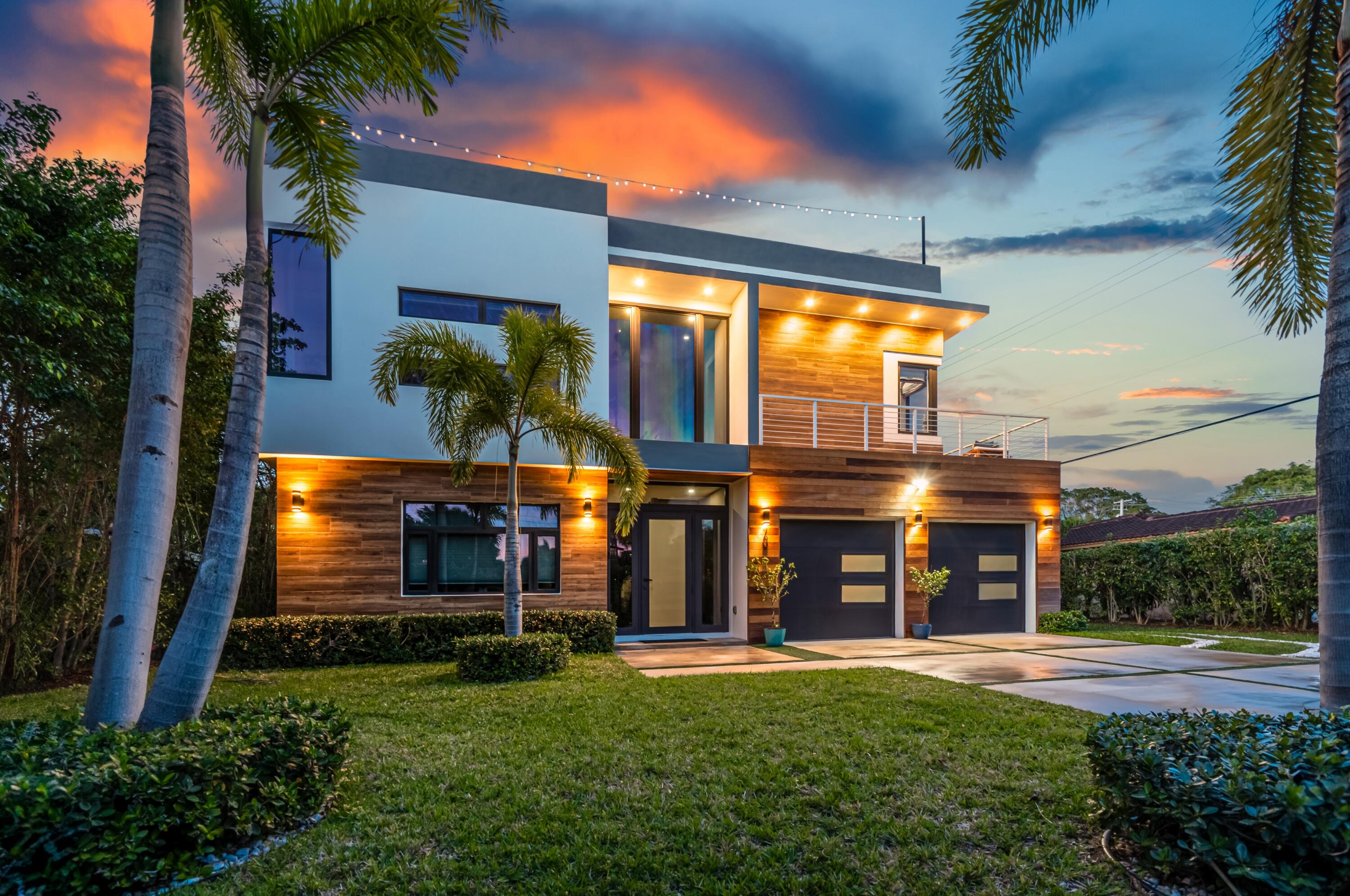 709 Northwest 6th Drive Boca Raton, FL 33486 - Photo 1 of 45 front view of house with a yard