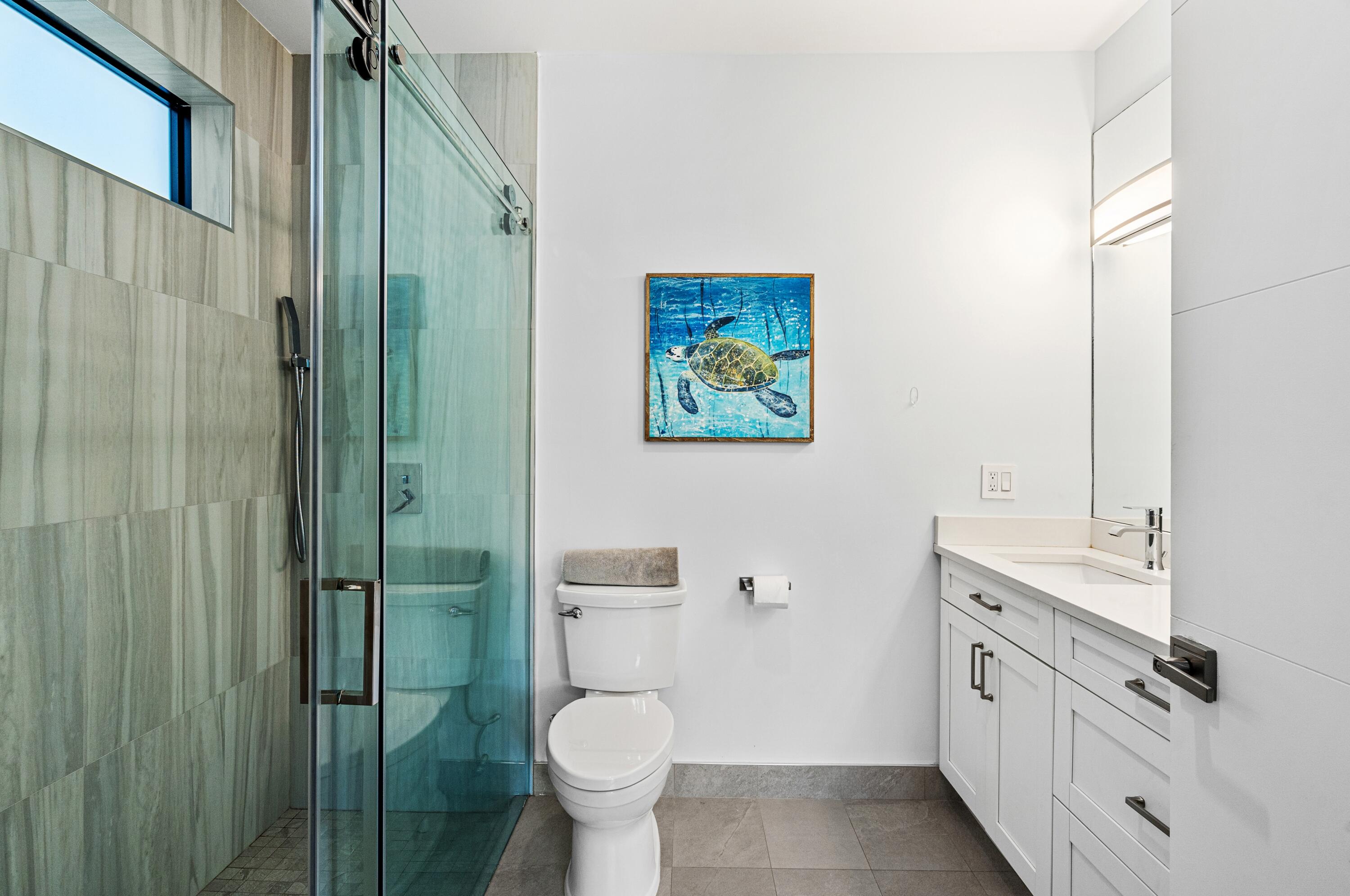 709 Northwest 6th Drive Boca Raton, FL 33486 - Photo 16 of 45 a bathroom with a toilet sink and shower