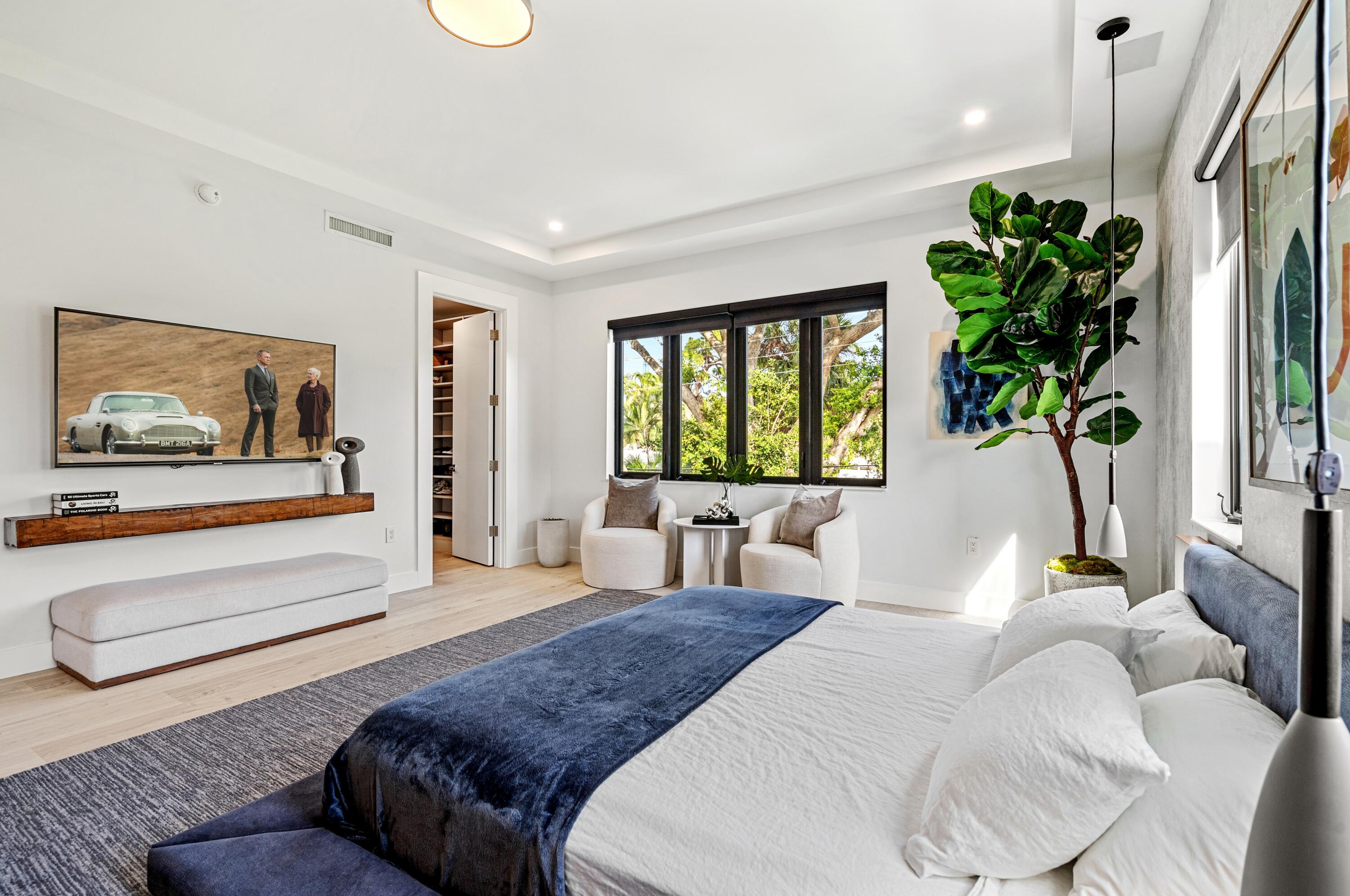 709 Northwest 6th Drive Boca Raton, FL 33486 - Photo 18 of 45 a bedroom with a bed couch and window