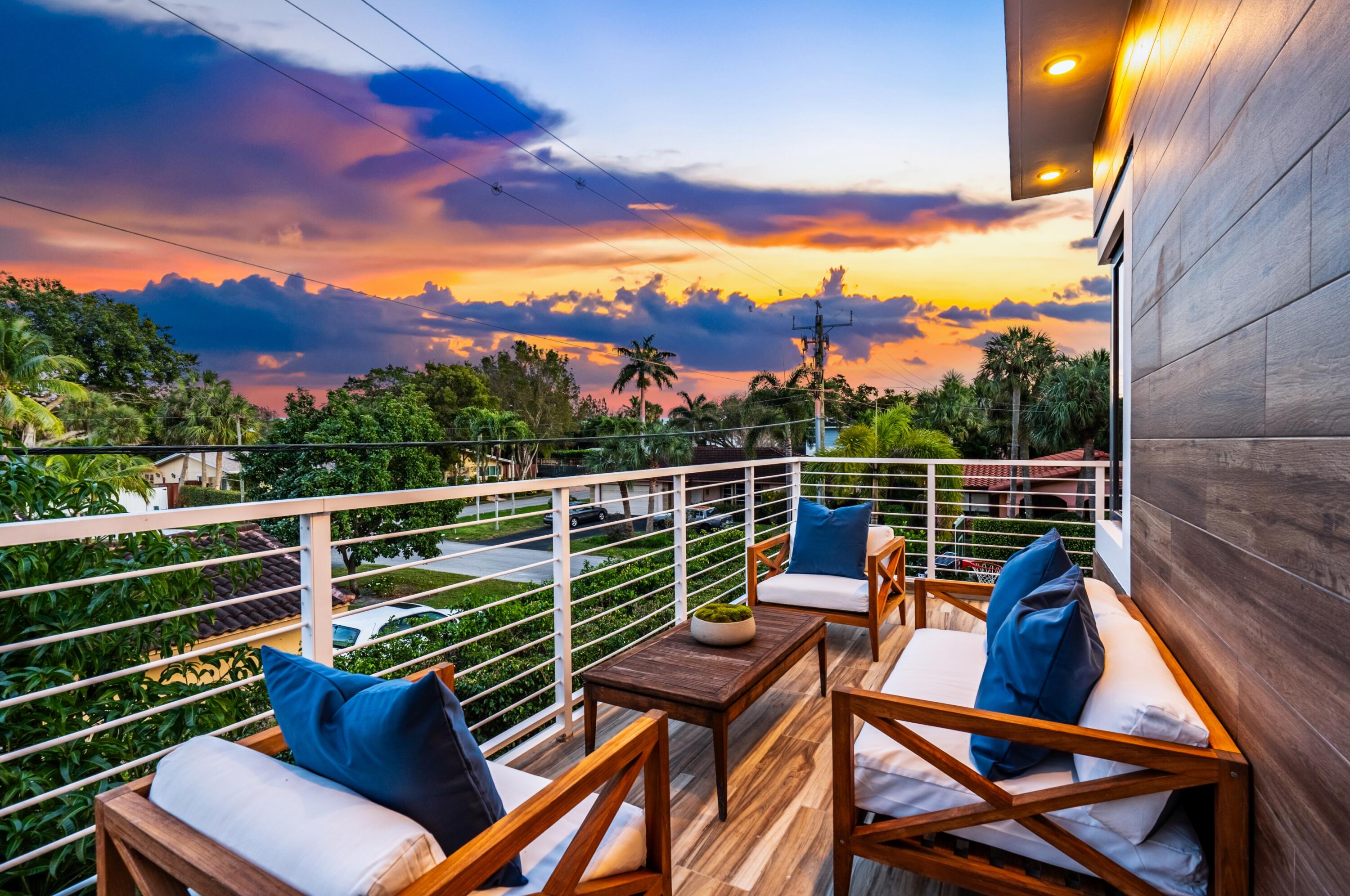 709 Northwest 6th Drive Boca Raton, FL 33486 - Photo 30 of 45 a view of a chairs and table in the balcony