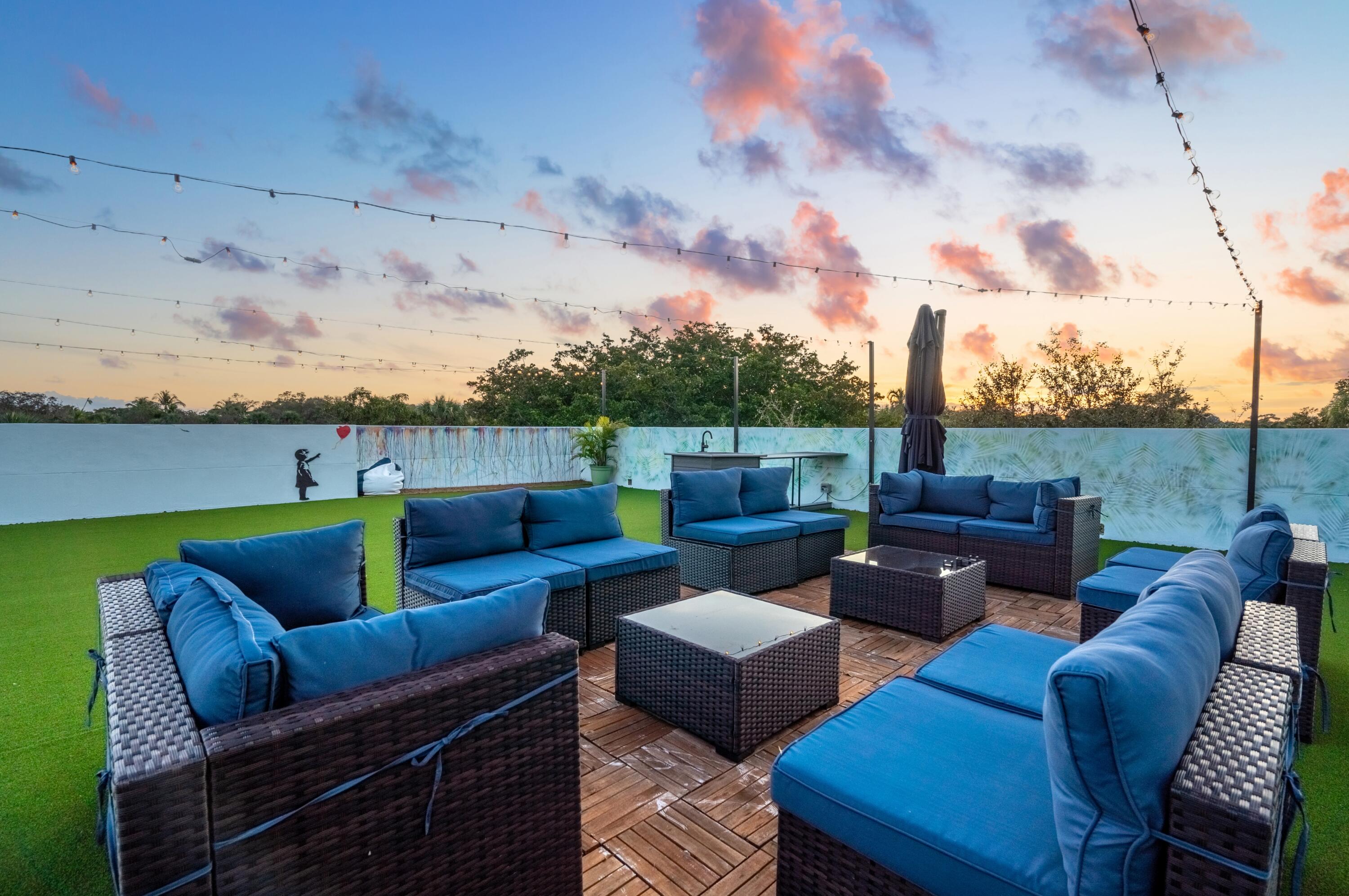 709 Northwest 6th Drive Boca Raton, FL 33486 - Photo 32 of 45 a couch sitting in the middle of a building