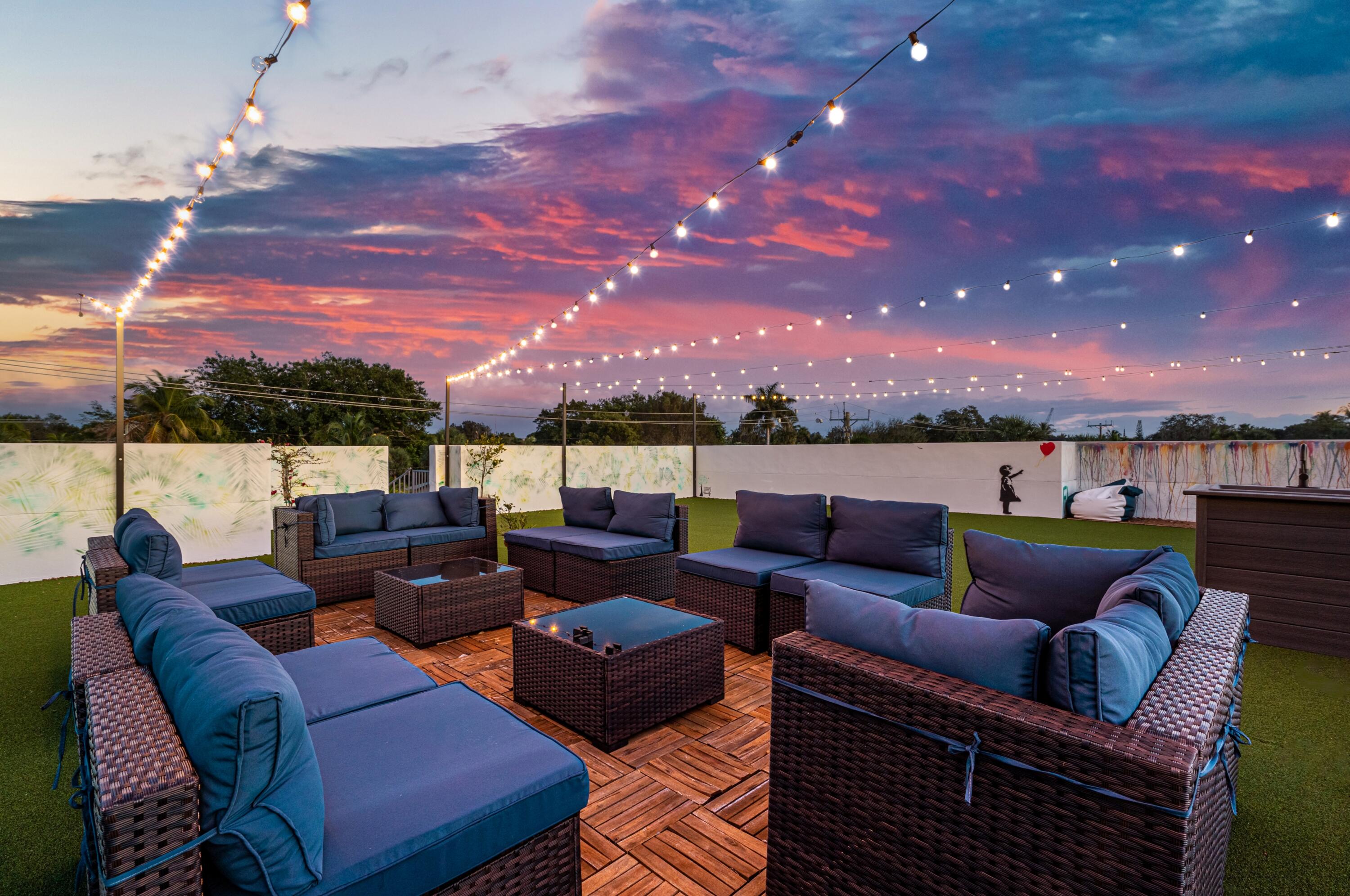 709 Northwest 6th Drive Boca Raton, FL 33486 - Photo 33 of 45 a roof deck with a potted plant and outdoor seating