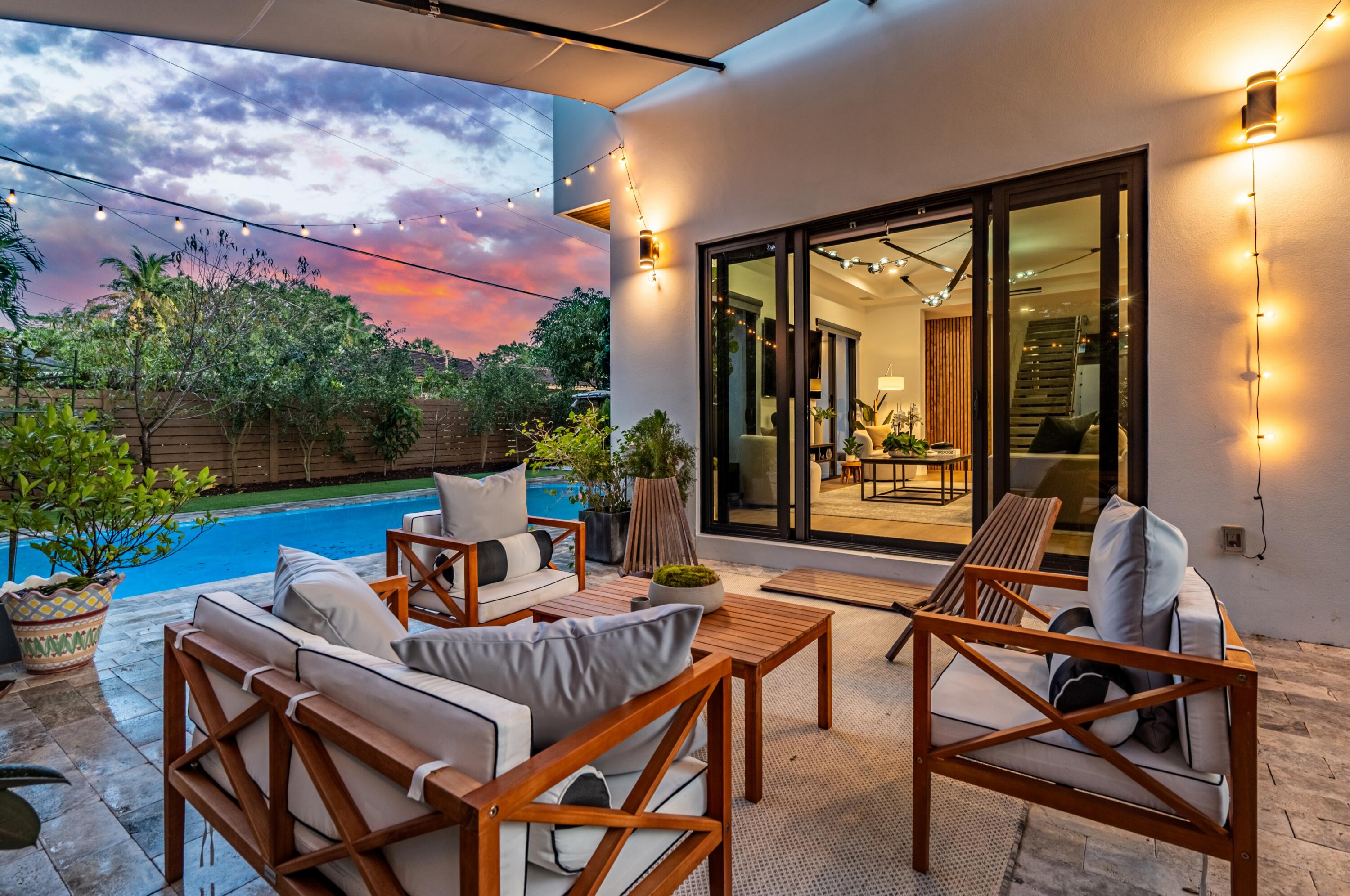 709 Northwest 6th Drive Boca Raton, FL 33486 - Photo 41 of 45 a outdoor living space with furniture and garden view